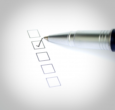 Pen putting a checkmark
